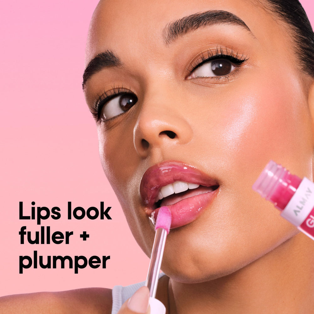 Almay Gleam Big open cap and applicator demonstrating easy glide