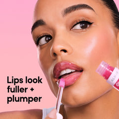 Almay Gleam Big open cap and applicator demonstrating easy glide