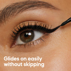 Almay liquid liner application on eye creating defined lash line