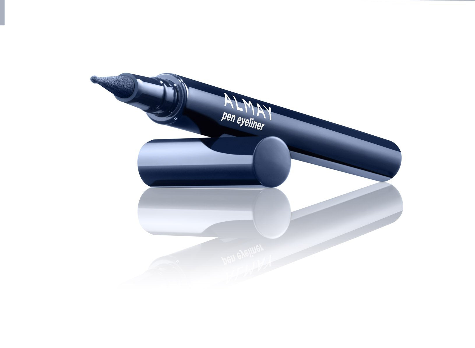 Almay navy eyeliner size and scale next to finger showing compact travel-friendly design