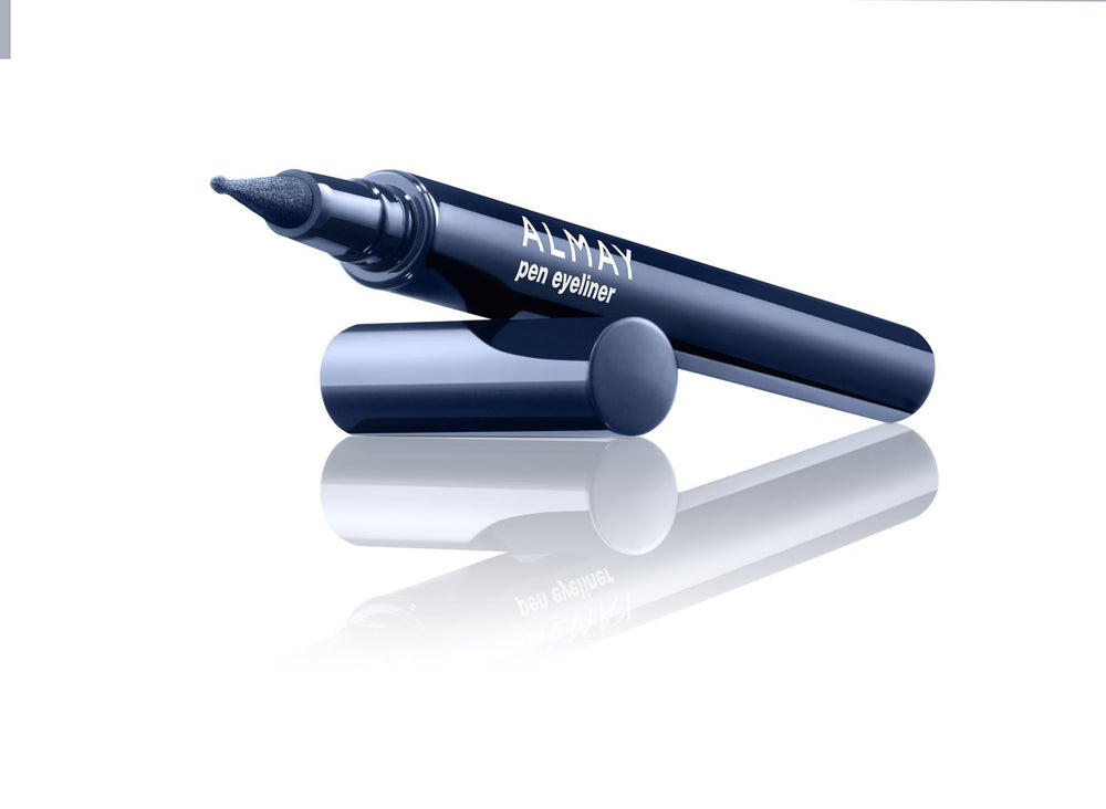Almay navy eyeliner size and scale next to finger showing compact travel-friendly design