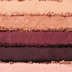 Almay primer pan closeup highlighting vitamin E base — smoother application benefit