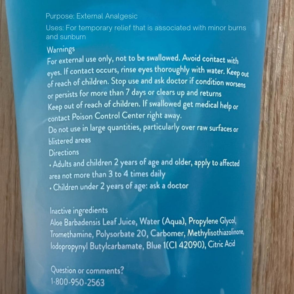 ALOE UP open cap with gel dispensing, showing smooth texture and quick application benefit