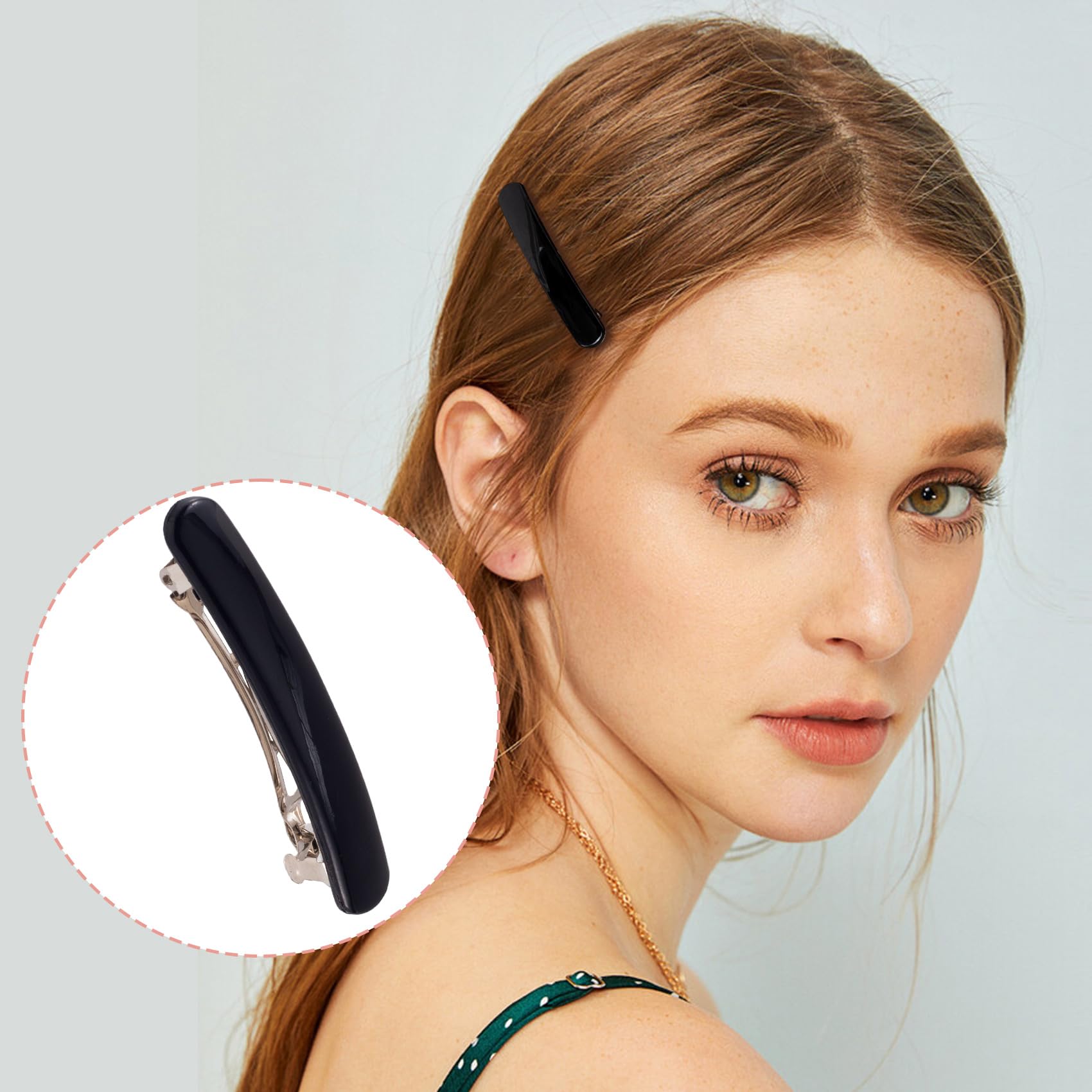 Alpinleux barrette next to hand for scale showing 2.48-inch size benefit
