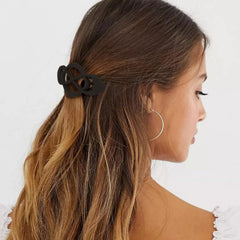 Amariver barrette clipped in hair demonstrating a tidy half-up style benefit