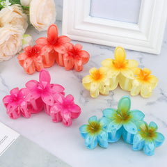Amariver clips styled on a beach towel showing tropical look benefit for summer outfits