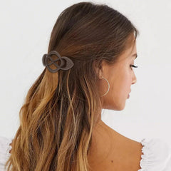 Amariver clip holding half-up hairstyle demonstrating tidy hold benefit