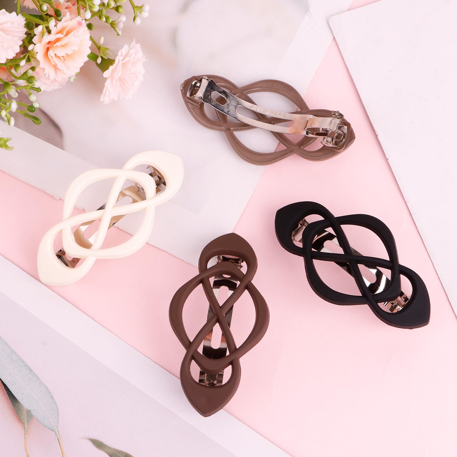 Amariver barrette next to a hand showing scale, clear size for medium to thick hair