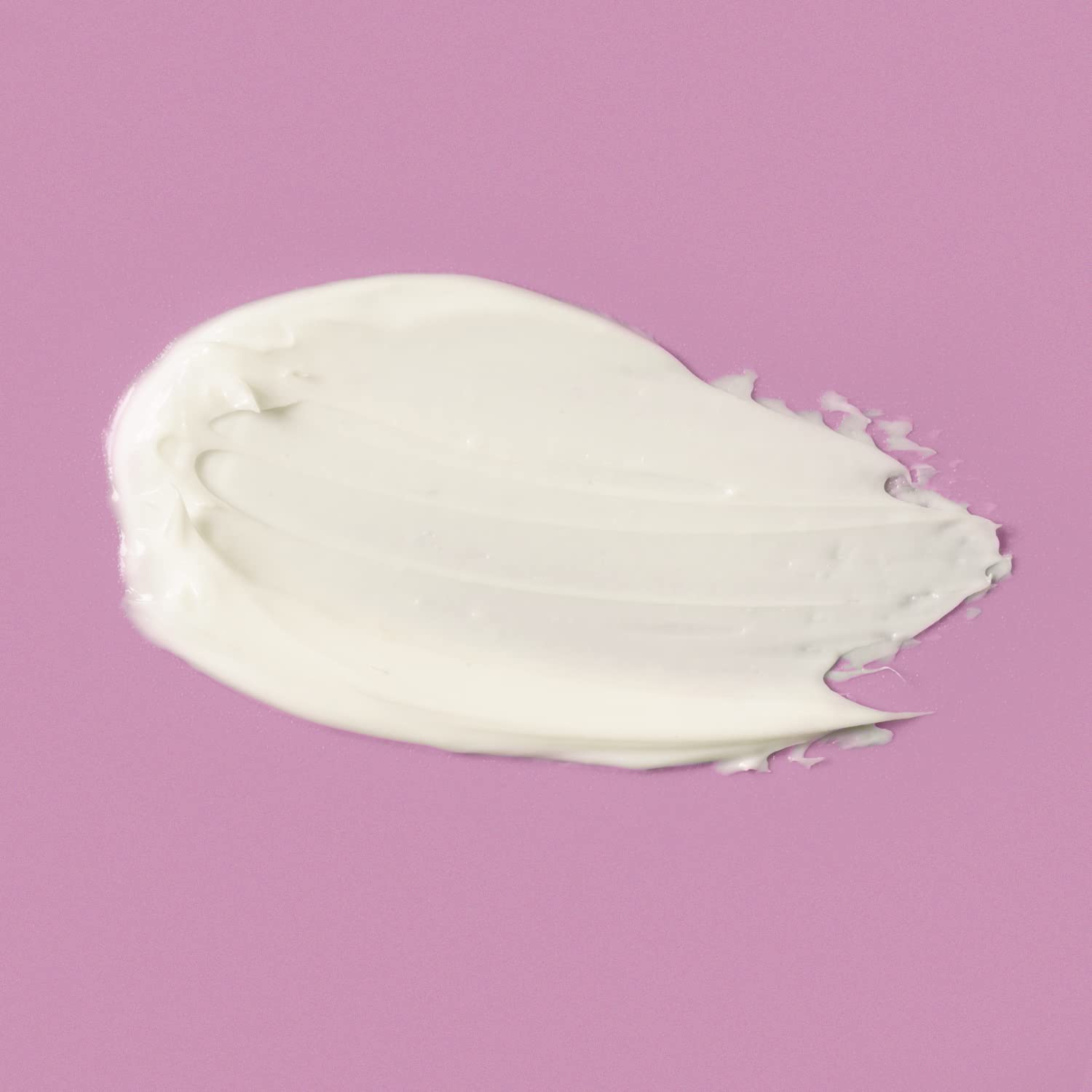 Amazon Basics cream on hand demonstrating easy spread and immediate hydration