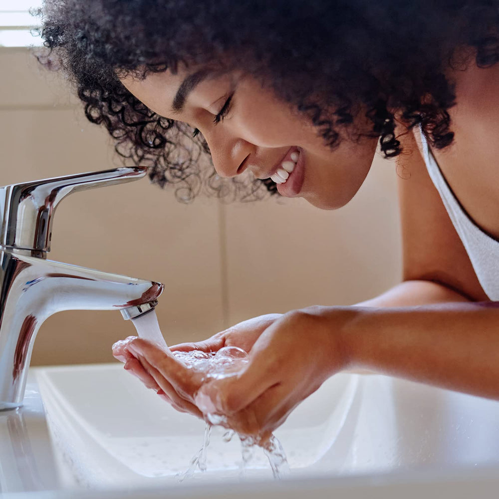 Amazon Basics cleanser on bathroom counter in everyday routine