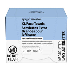 Amazon Essentials towel in hand to show scale and easy one-handed use benefit