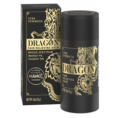 Americanna Wellness Dragon Balm rollerball closeup on skin showing smooth application and precise control