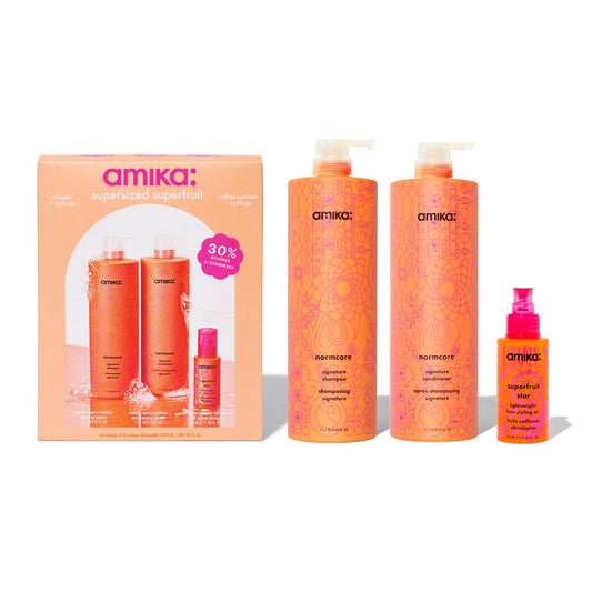 Amika front packaging set showing large shampoo conditioner and styling oil for value