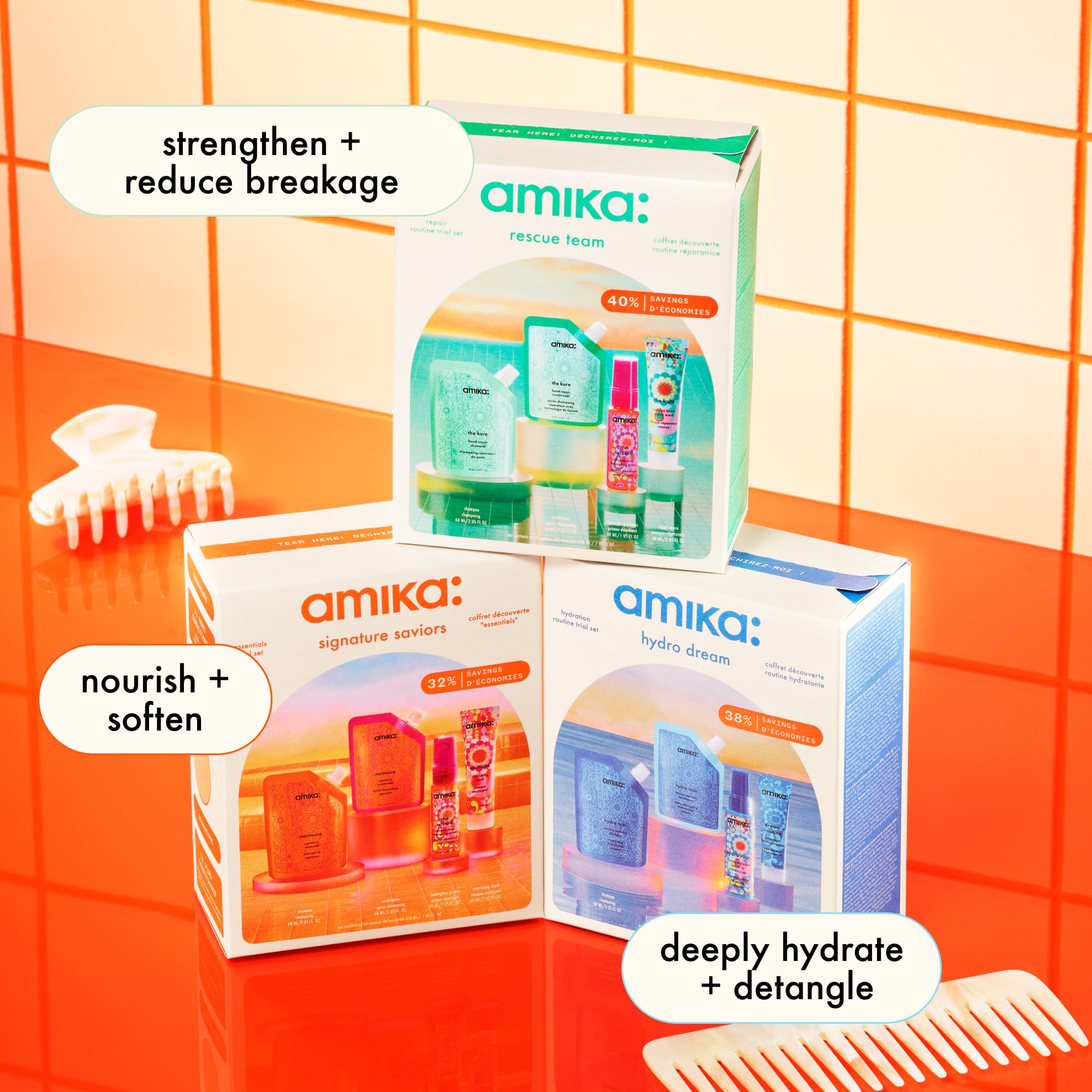 Amika mini bottles next to a hand showing compact, TSA-friendly size