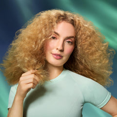 amika the closer used by stylist in salon, amika shown, professional smoothing result