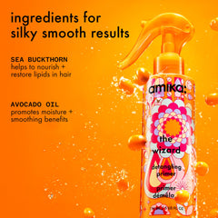 amika The Wizard formula drop close-up showing lightweight texture and hydrating effect