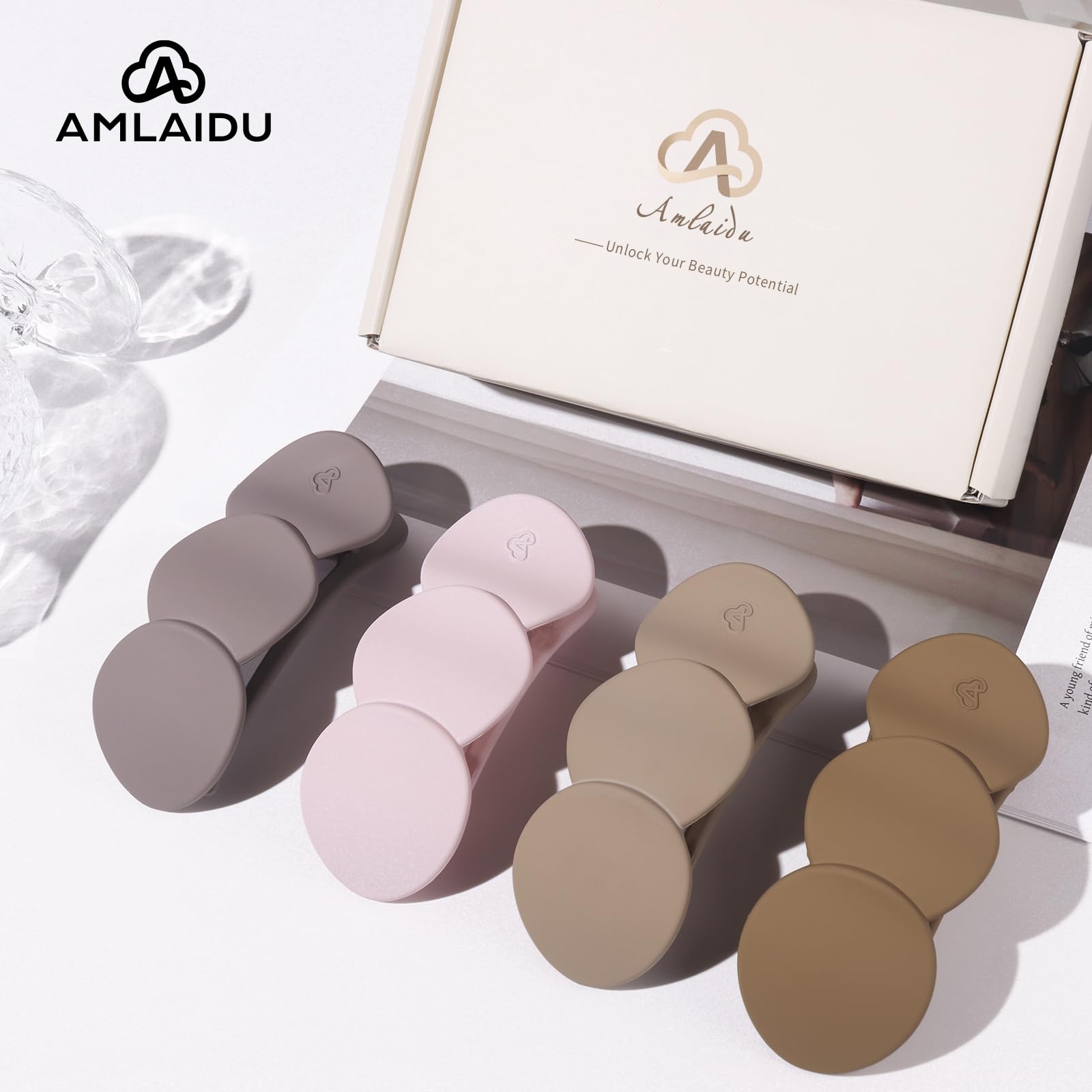 Amlaidu clip held in hand to show scale and portability for travel