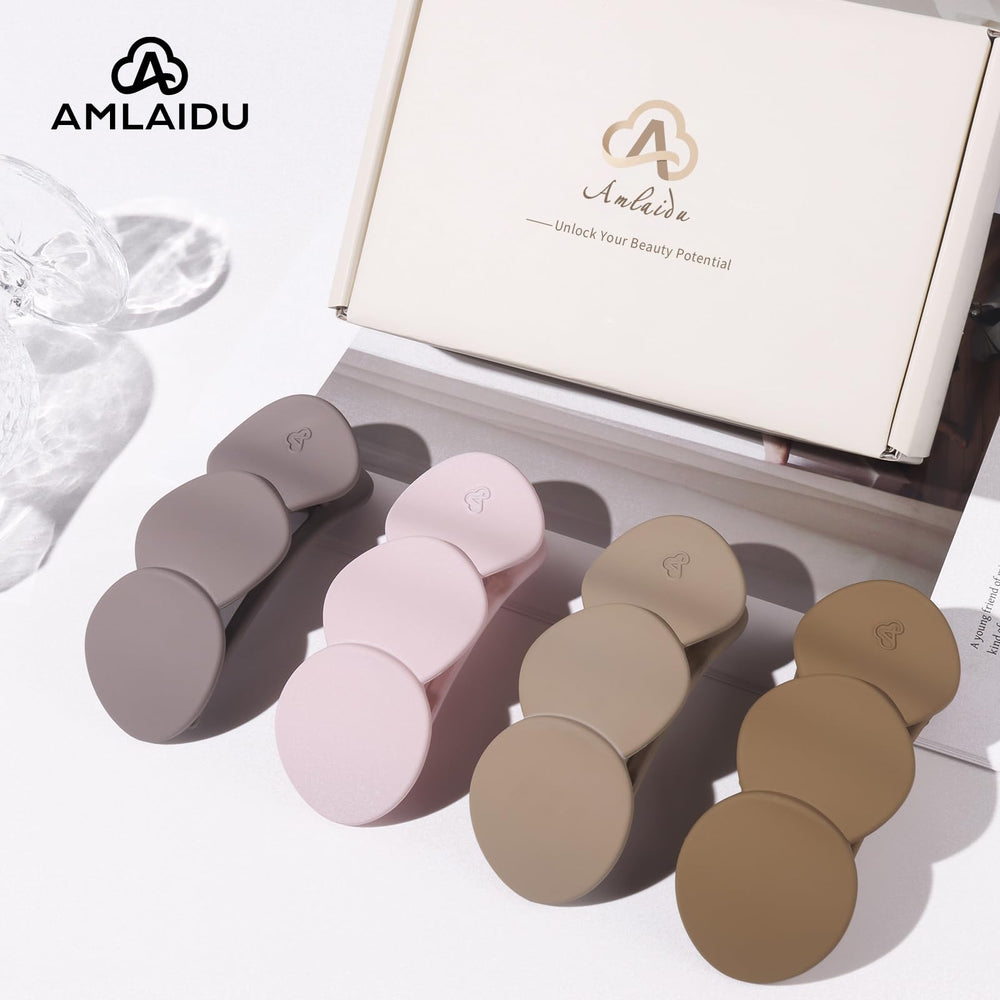 Amlaidu clip held in hand to show scale and portability for travel