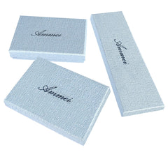 Ammei Headpiece group arrangement on fabric showing cohesive set and versatility