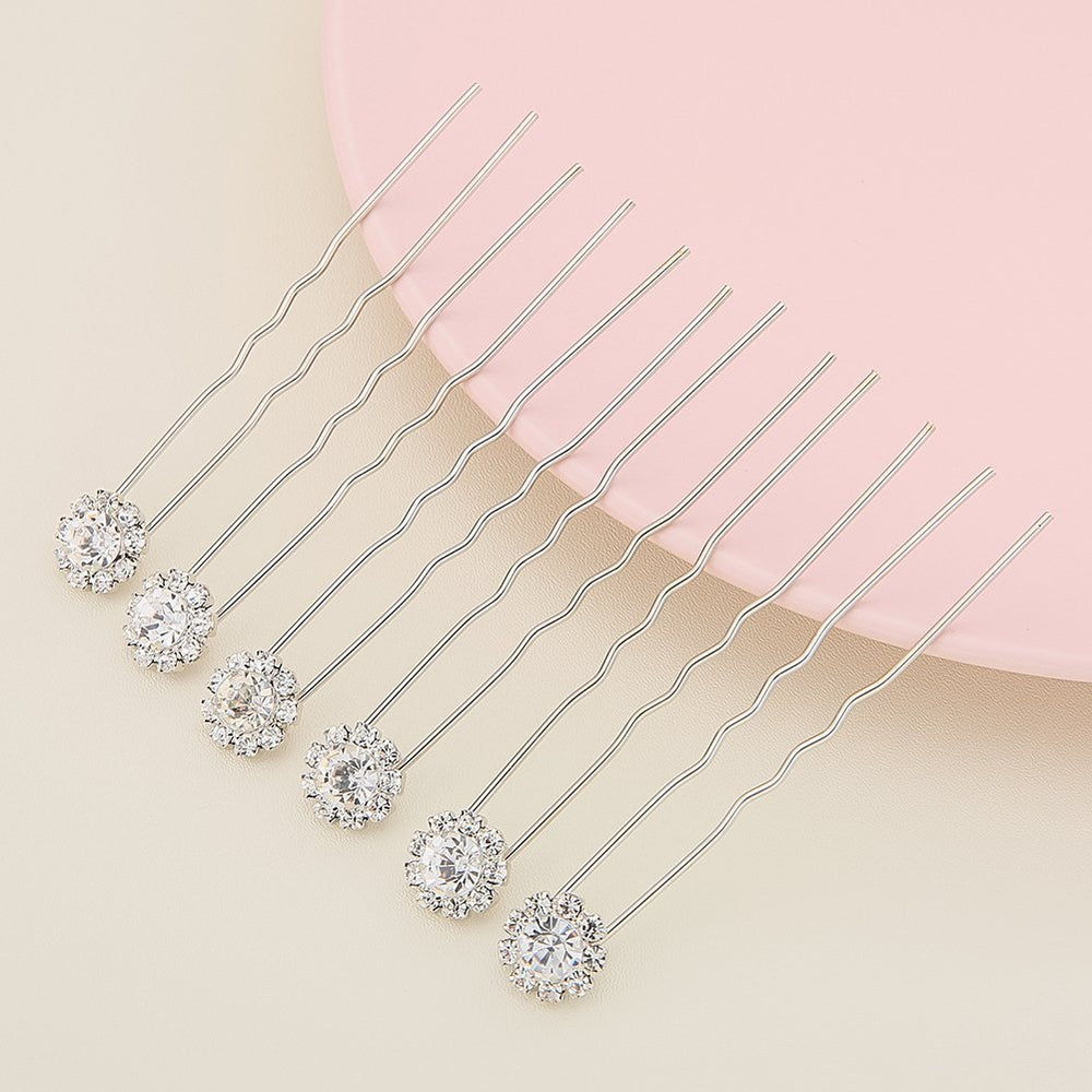 Ammei Headpiece placed in bridal updo demonstrating secure hold and subtle shimmer