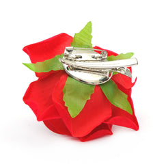 Amuhou brooch pinned on a bridal dress adding elegant accent