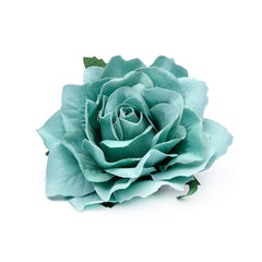 Amuhou flower held in hand showing 3.9-inch size for scale