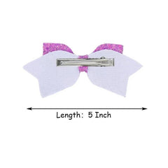 Amybasic girl wearing bow in ponytail showing colorful accent for photos and festive outfits