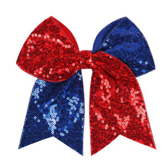 AMYDECOR front view of jumbo glitter bow showing bold red blue sparkle and team spirit