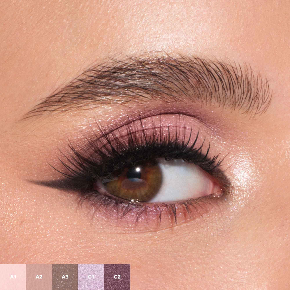 Anastasia Beverly Hills mini sugar palette held in hand to show compact travel-friendly size