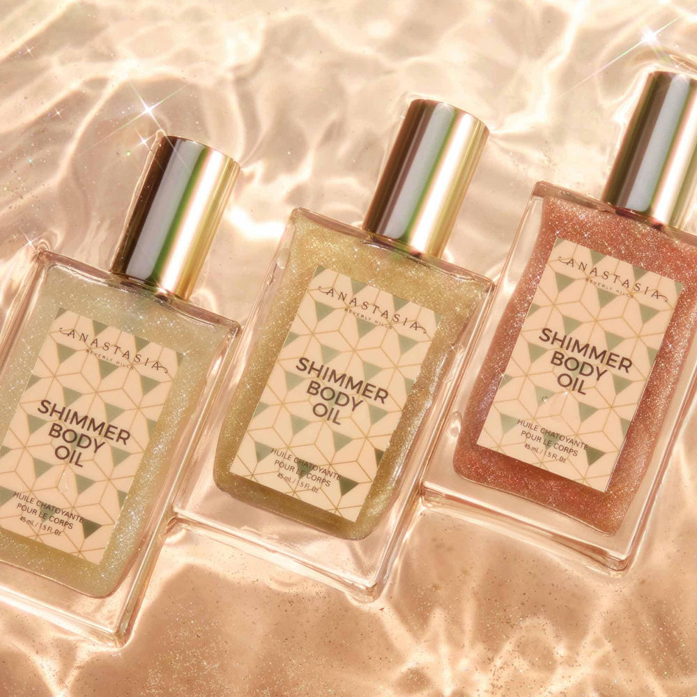 Anastasia Beverly Hills bottle in hand showing size and portable luxury for travel benefit