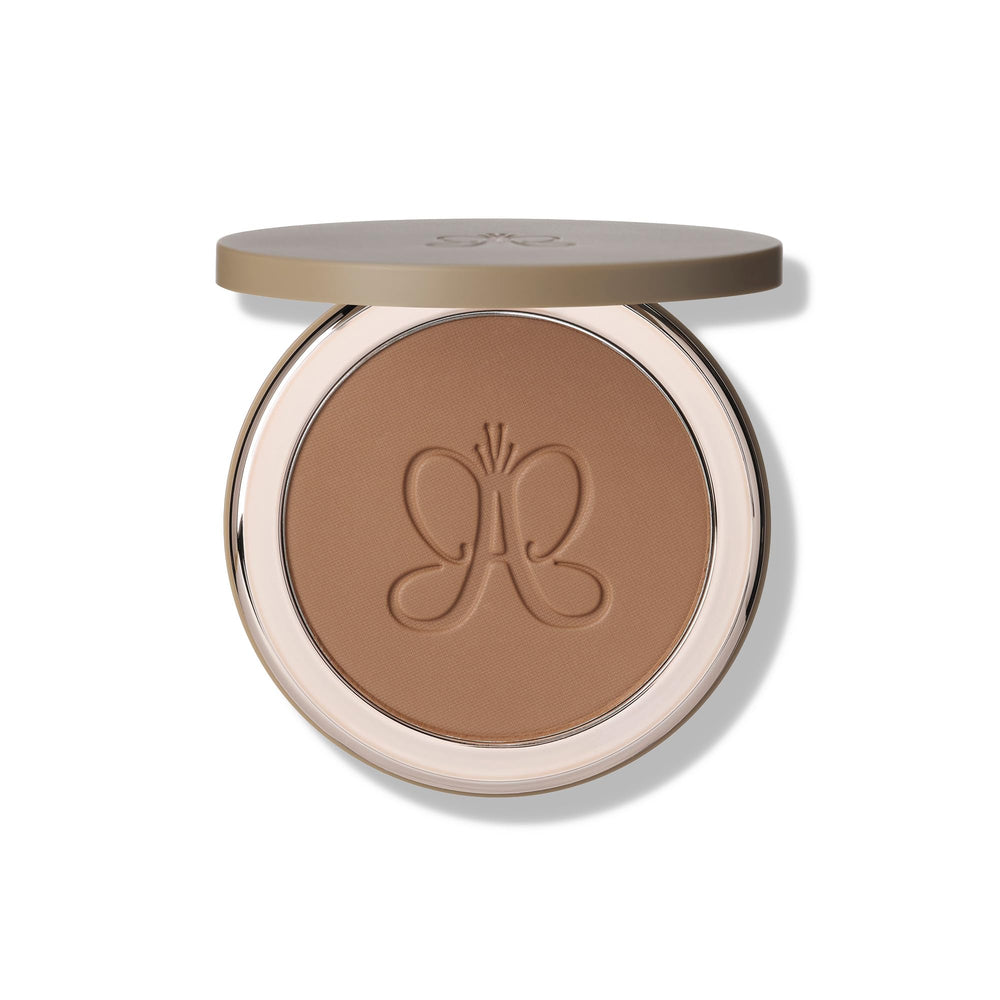 Anastasia Beverly Hills front compact showing sleek logo and travel-ready benefit