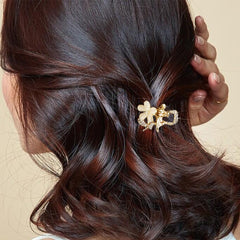 ANBALA close-up of five-leaf flower detail highlights rhinestones and refined finish