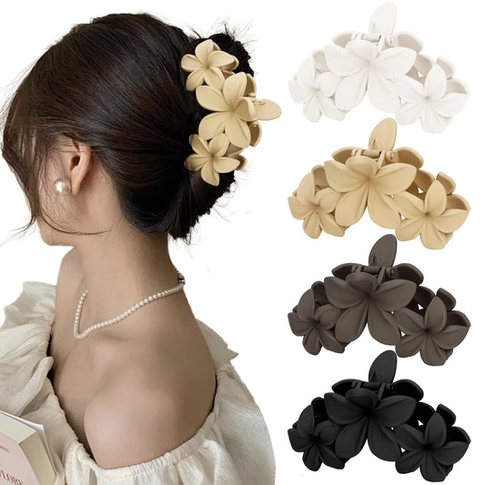 ANBALA front view of four plumeria clips showing colors and design, adds style