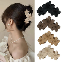 ANBALA front view of four plumeria clips showing colors and matte finish, stylish accessory