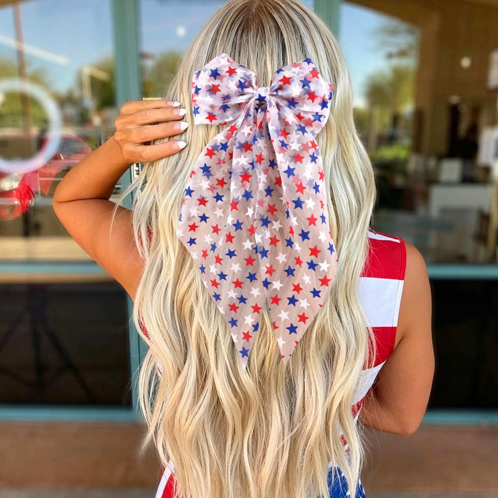 ANBALA hair bow on a child at an outdoor parade showing celebratory look
