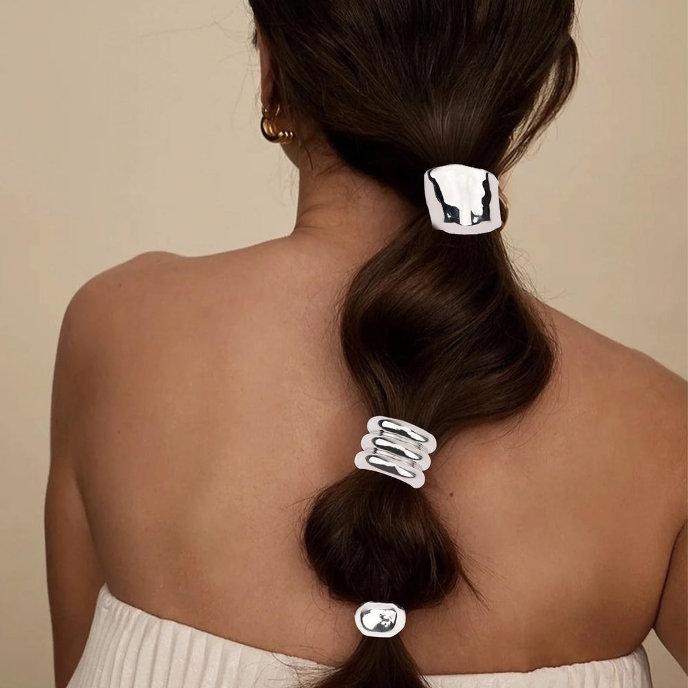 ANBALA cuff securing ponytail in use, keeps hair tidy during activity