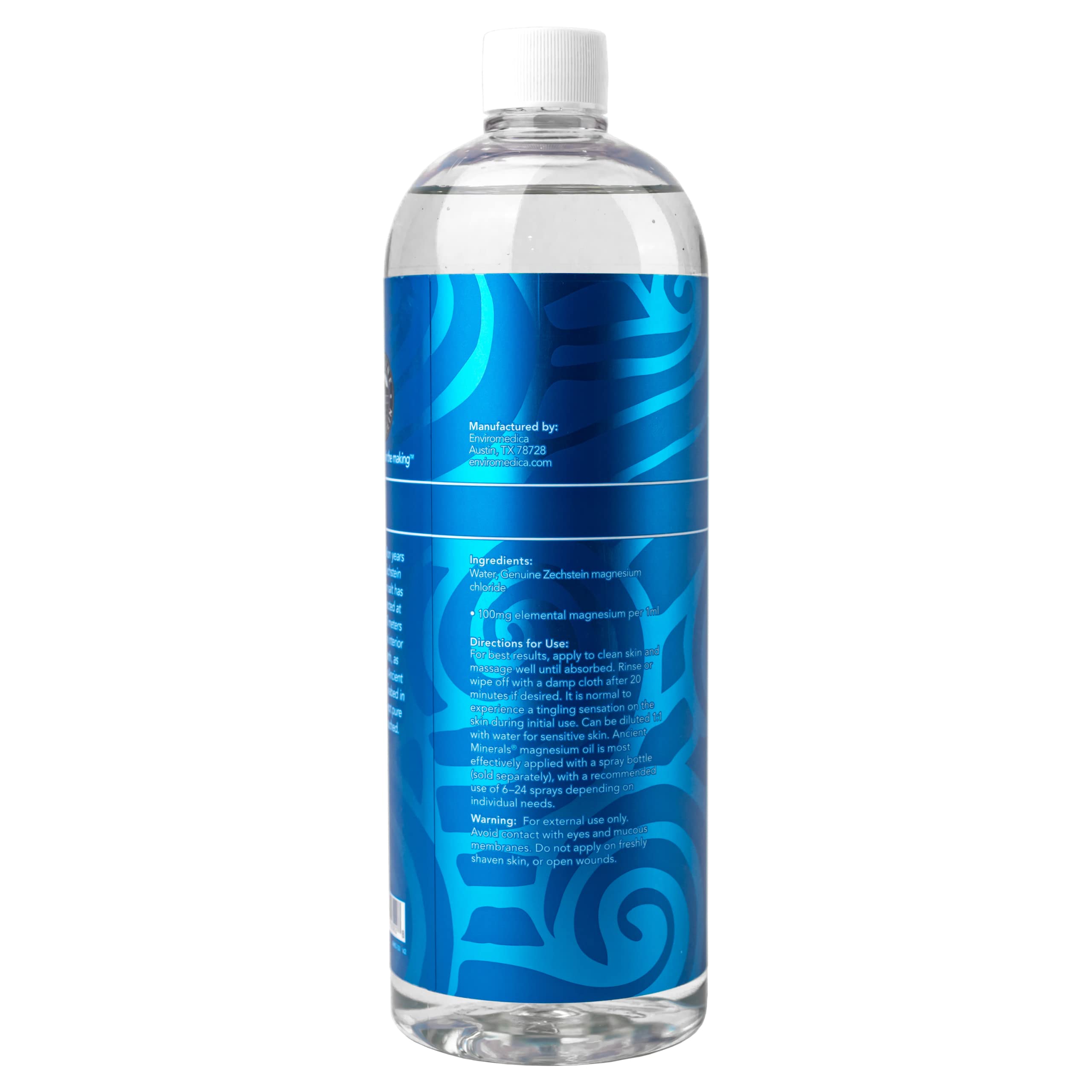 Ancient Minerals 33oz bottle held in hand to illustrate refill volume and scale