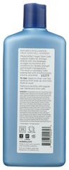 Andalou Naturals conditioner pouring from open cap for easy application