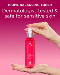 Andalou Naturals size comparison in hand demonstrates portable 6 fl oz convenience