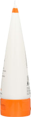 Andalou Naturals bottle next to everyday items showing travel-friendly size