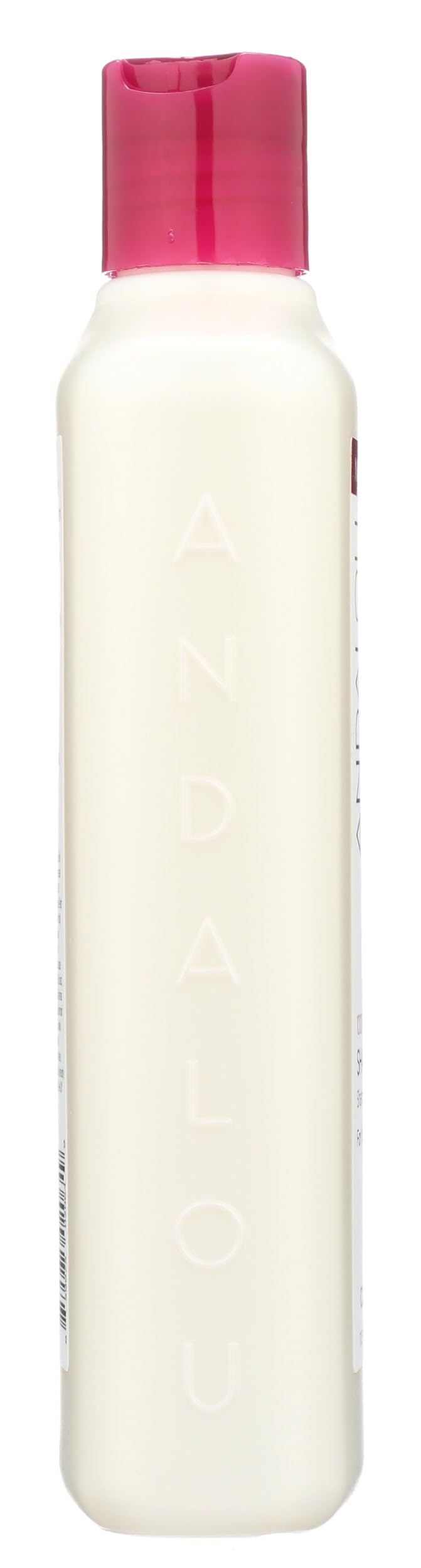 Andalou Naturals 11.5 fl oz bottle beside a ruler to show scale