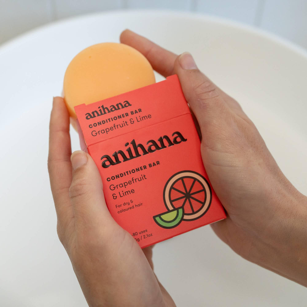 ANIHANA conditioner bar paired with shampoo in lifestyle setting for sustainable routine