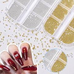 AnoleAir beads applied on acrylic nail demonstrating metallic accent and lasting finish
