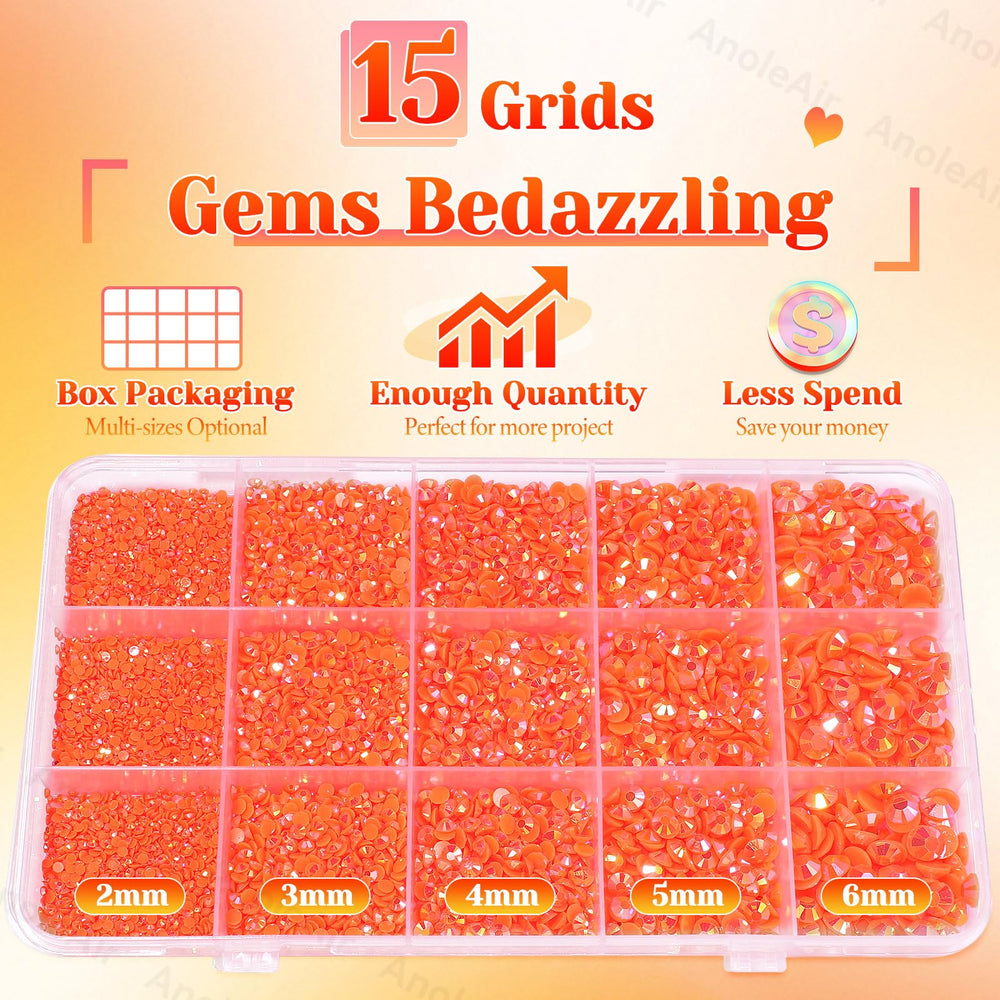 AnoleAir tweezers and pickup pencil beside scattered gems for easier application