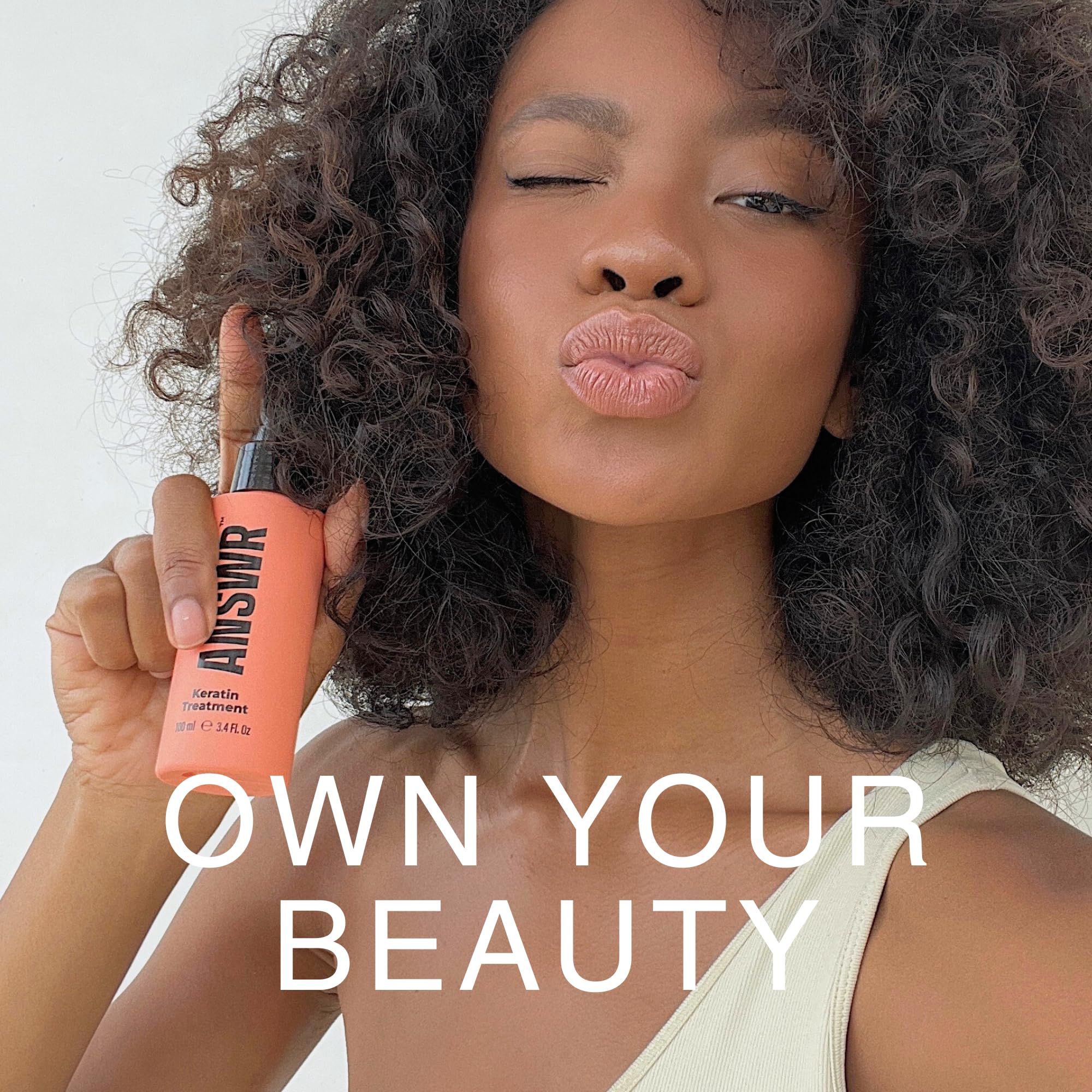 ANSWR label close-up highlighting vegan and sulfate-free benefit
