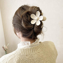 AOENJIE flower clip styled in half-up hair demonstrating secure hold