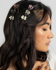 AOENJIE lifestyle photo of girl wearing multiple clips, shows fun styling options