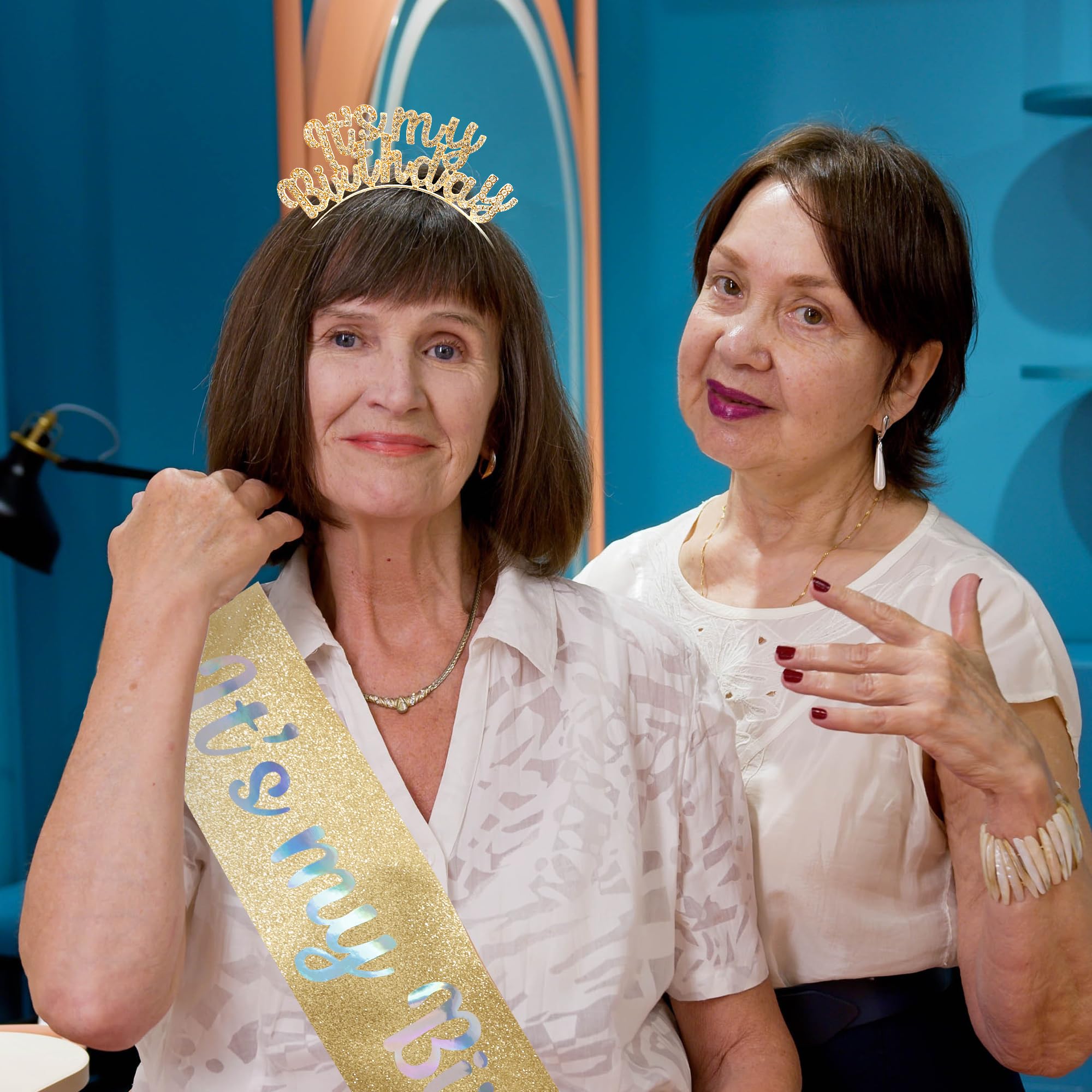AOPRIE tiara held in hand to show compact size and easy travel benefit