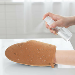 Apausvcm lifestyle shot on bathroom vanity conveying convenient at-home tanning