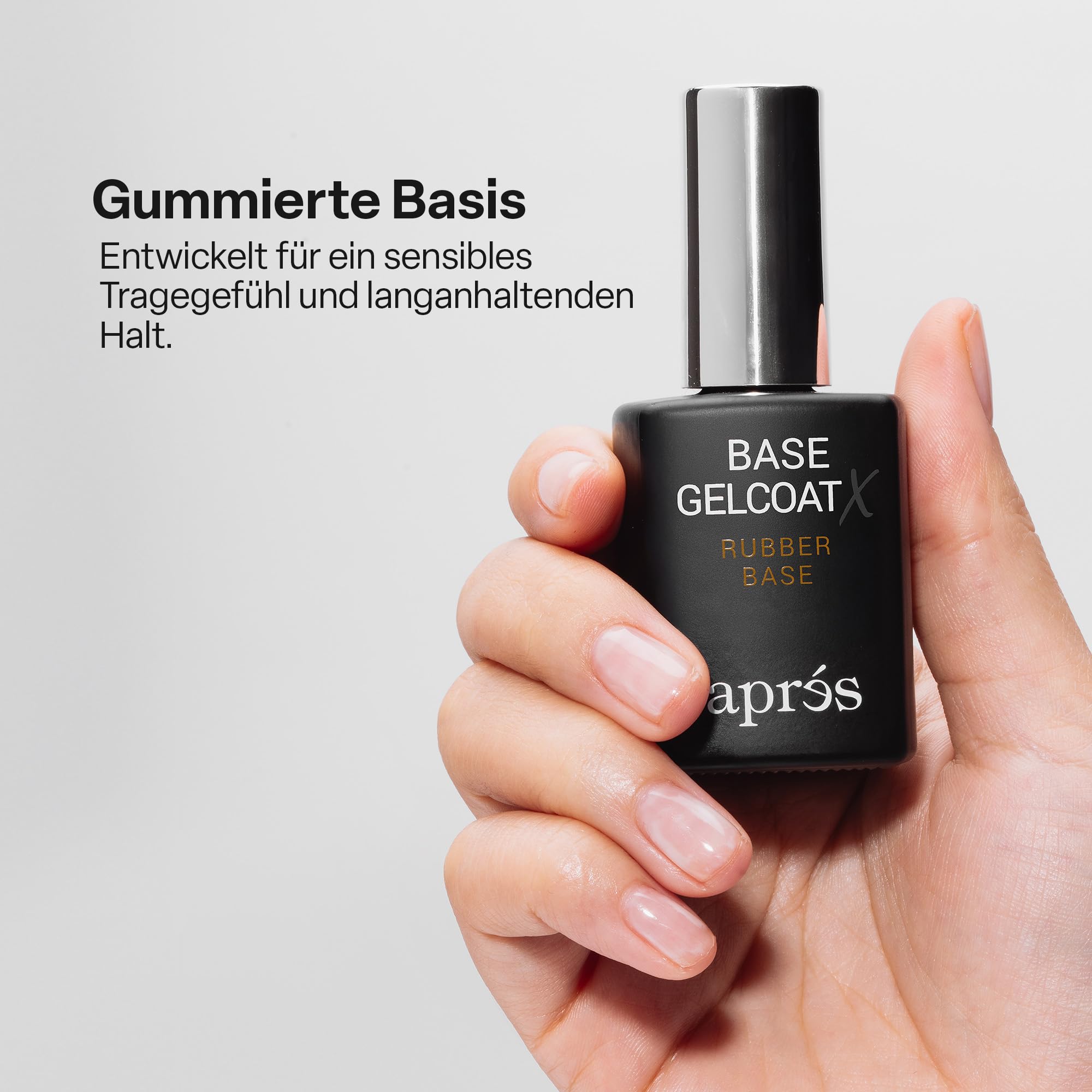 APRÉS brush applying base coat to nail demonstrating smooth, controlled application